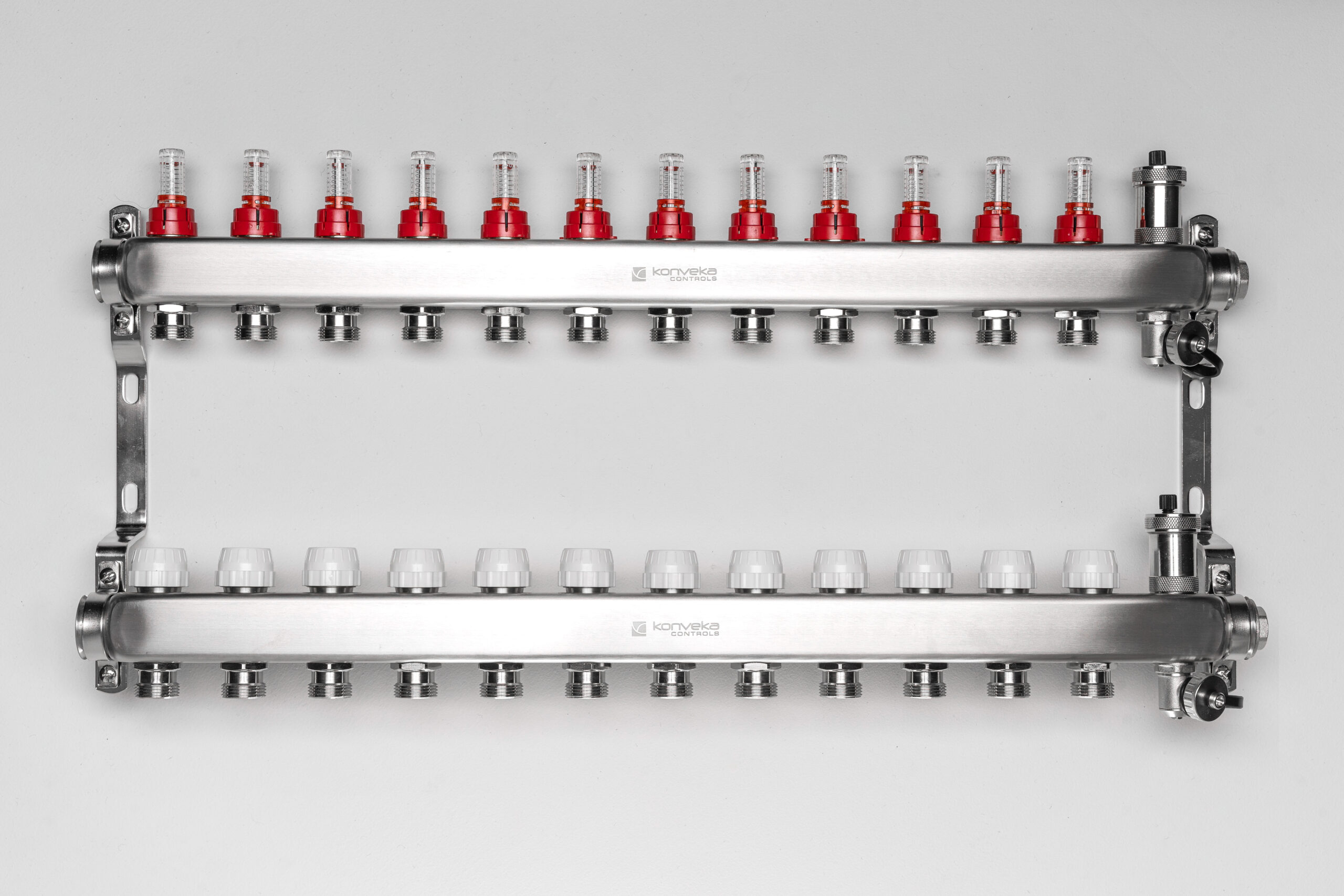 Reguliuojamas 12 ž. paskirstymo kolektorius su debitomačiais